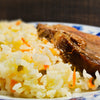 CHULETA DE CERDO ARVEJADA CON ARROZ