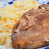 CHULETA DE CERDO ARVEJADA CON ARROZ